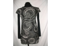 http://www.in-stylefashion.pl/Tunika_z_golfem_OKAZJA-385.html.Tuniczka w piękne wzory - 59,00zł!!!
