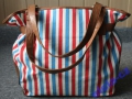 http://moda.allegro.pl/torebka-atmosphere-xxl-karmel-marynarskie-paski-i1674539360.html  49,99 zł