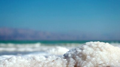 stock-footage-close-up-of-salt-deposits-on-the-banks-of-the-dead-sea-in-israel-the-dead-sea-and-the-jordanian
