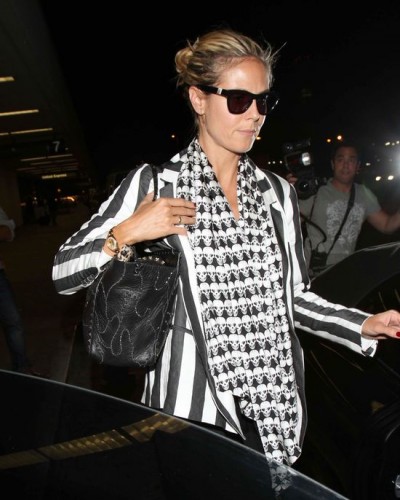Heidi Klum Lands At LAX Airport