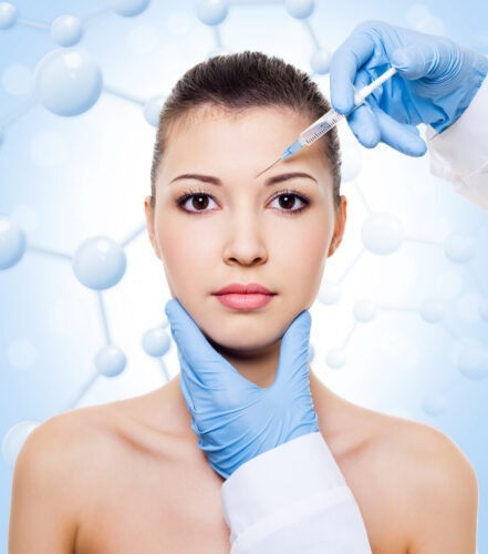 Injection of botox in beautiful woman face
