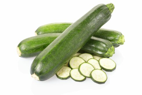 Zucchini or courgette sliced isolated on white, clipping path included