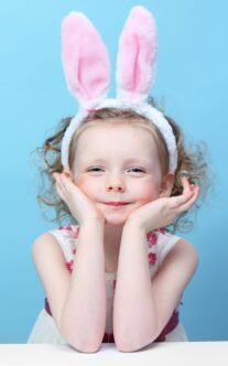 Little, fun girl with bunny ears