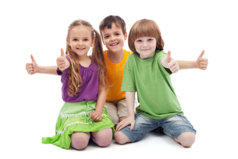 Three kids giving thumbs up sign