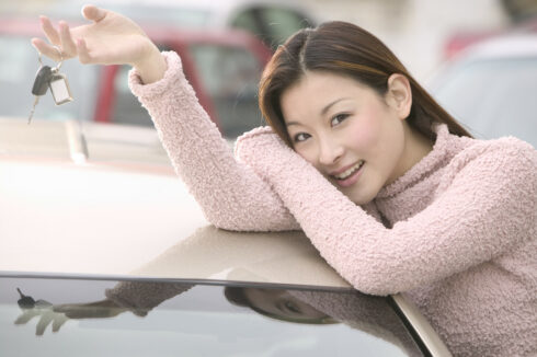Smiling Woman Holding Car Keys 2003