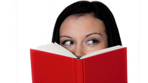 young_woman_reading_a_red_book_visual_stage