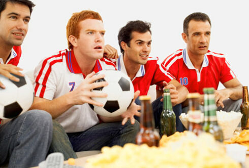 soccer_fans_watching_game_with_food