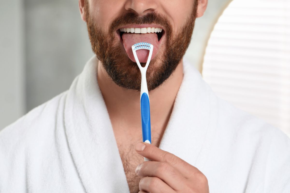 biały nalot na języku jak usunąć jak leczyć dentysta gdańsk
